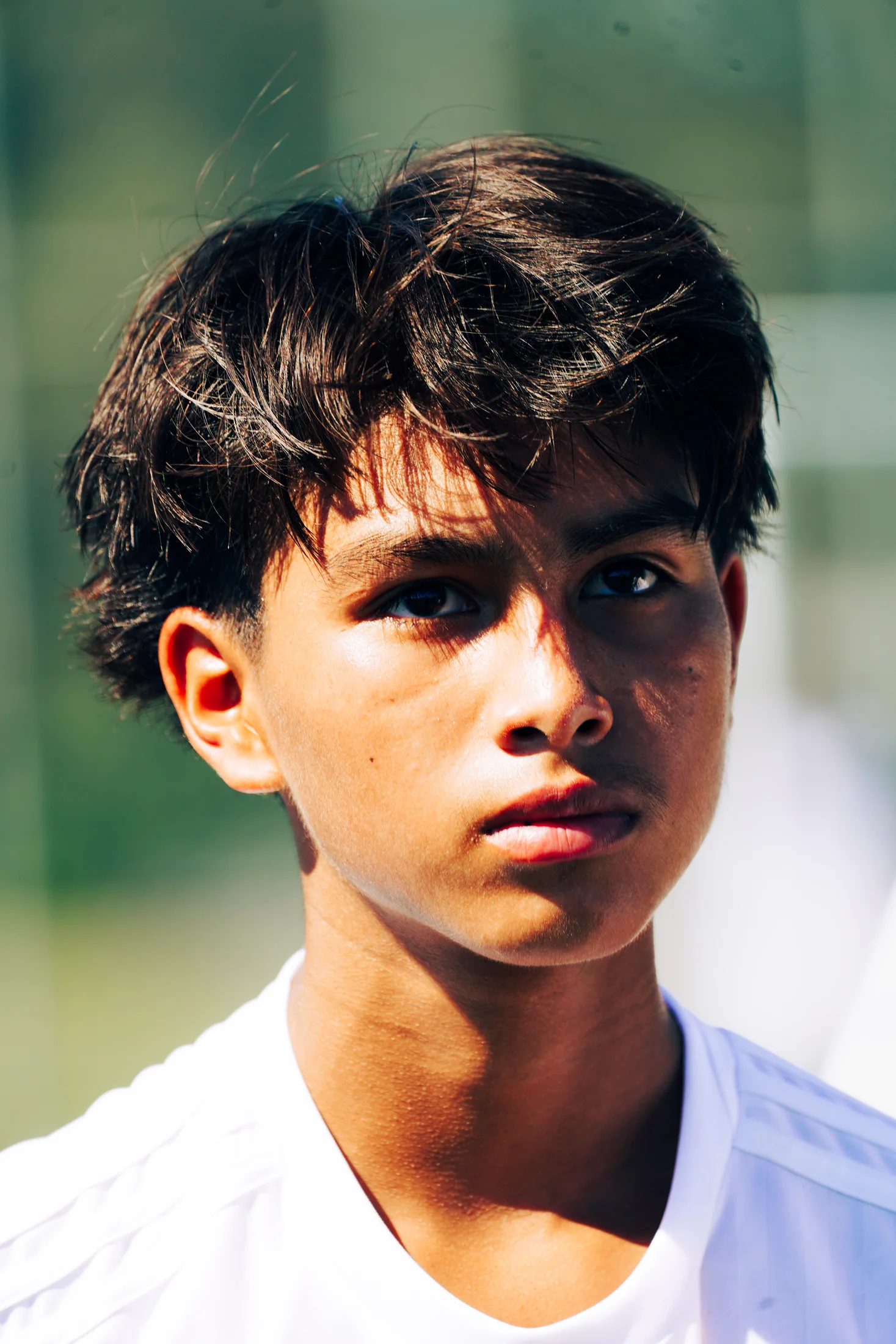Close portrait of a soccer player in afternoon light